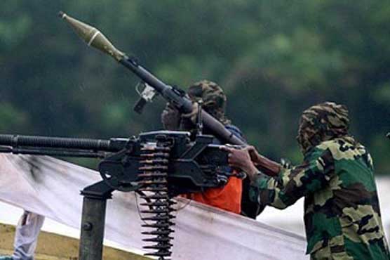 Nigeria gunman free two hostages, keep Dutch trio 