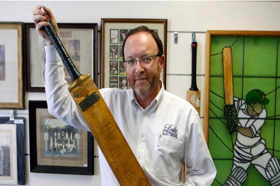 Bradman's first Test bat up for auction
