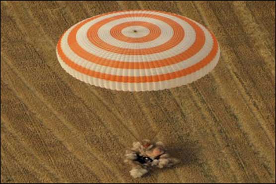 Three astronauts landed back on Earth in Kazakhstan