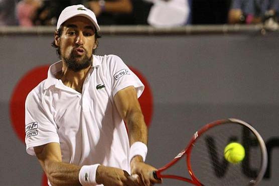 Tennis: Federer blown off court by Chardy; Nadal scrapes through