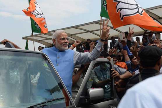 India PM-elect Modi mobbed by crowds on arrival in Delhi 