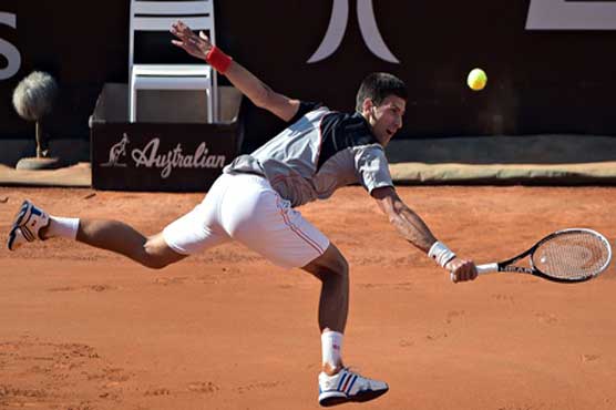 Djokovic into Rome final after epic Raonic struggle