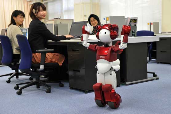 Japan's Hitachi unveils joking robot