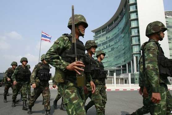 Thai army invokes martial law to quell unrest 