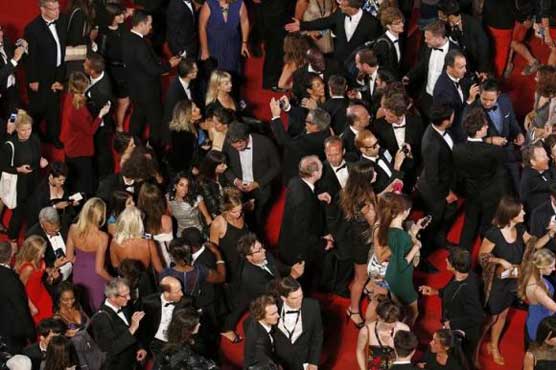 Cannes parties all night - and also shows films