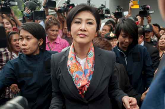 Thai ex-PM detained, junta to face media on coup