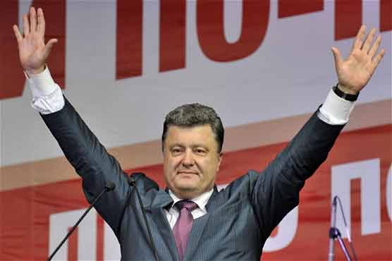 Chocolate king claims victory in Ukraine presidential vote