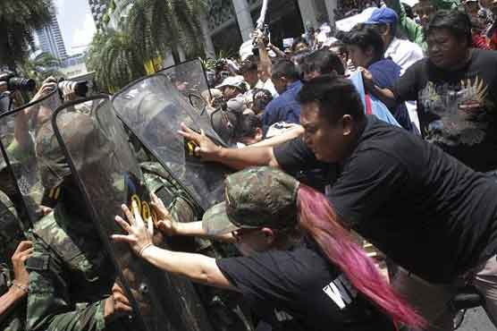 Thai army threatens action against anti-coup rallies