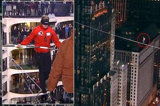 Daredevil walks rope between towers blindfolded