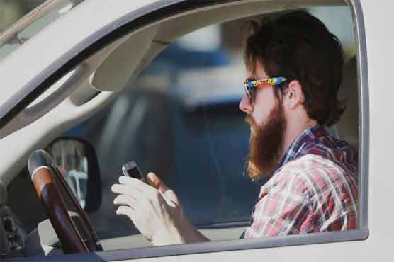 Survey finds people text and drive knowing dangers