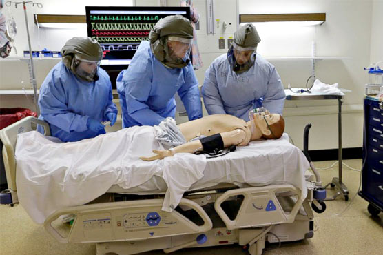 A look at the worst-ever Ebola epidemic by numbers