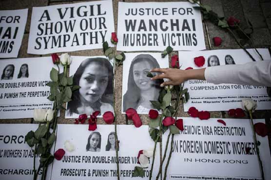 UK banker on double murder charge grins leaving Hong Kong court