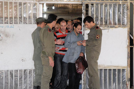Syria says 11,000 freed in prisoner amnesty