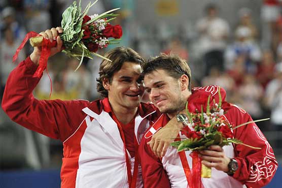 Federer, Wawrinka bury bad taste of London match on Twitter