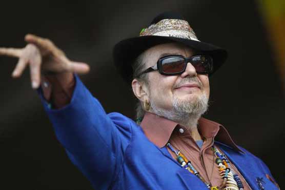 Decades in the grave, Louis Armstrong tells Dr John: 'play my music'