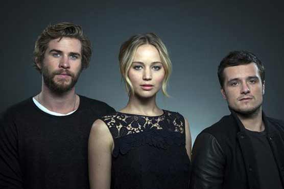 'Mockingjay' stars reflect on growing up together