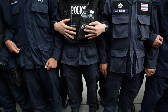 Two senior Thai policemen charged with royal defamation: official