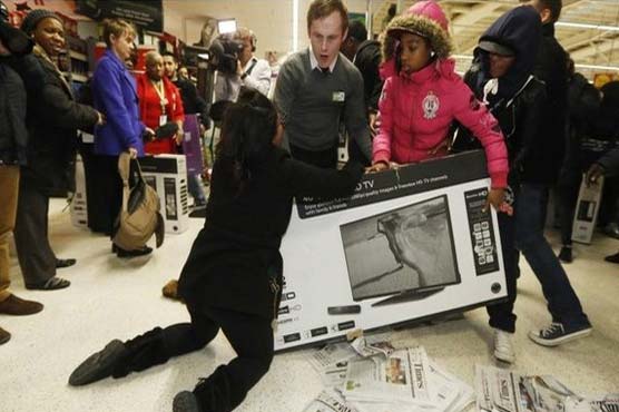 Mayhem as US 'Black Friday' hits Britain