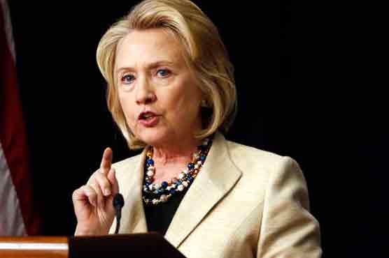 Clinton says military action in Iraq is essential