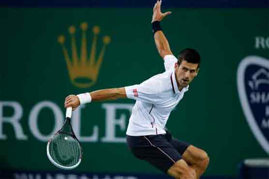 Djokovic, Federer reach quarters in Shanghai