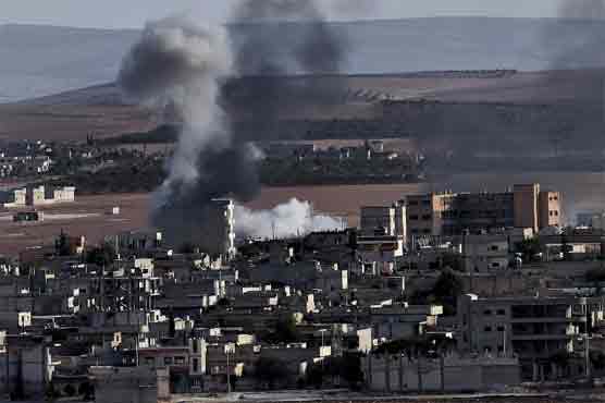 Kobane holds out against IS as US urges Turkey to get involved 