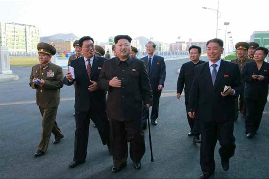 North Korea leader Kim re-appears, with walking stick