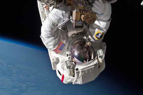US astronauts step out on spacewalk