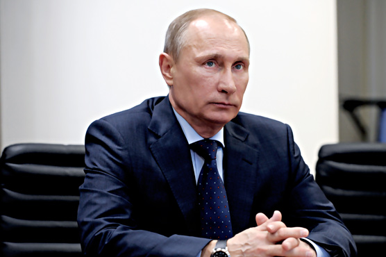 Putin accuses Obama of hostility, meddling