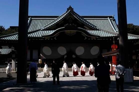 Japan ministers at Tokyo war shrine despite warming China ties 