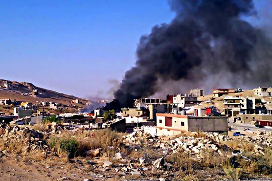 US-led strike kills 8 in IS-held Syria town