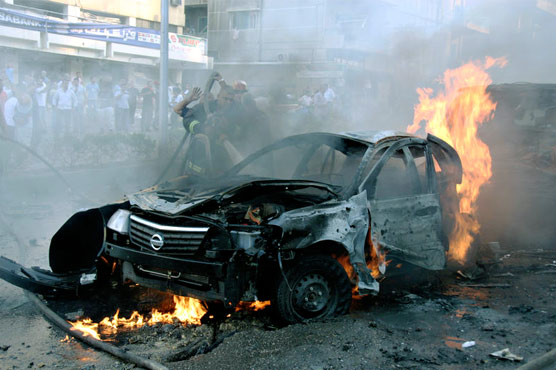 Car bombs kill at least 18 in Baghdad Shiite area