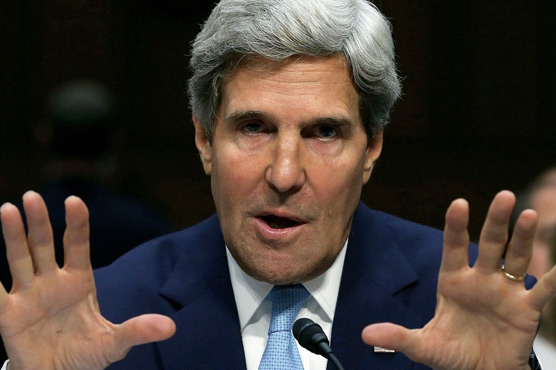 At Berlin Wall, Kerry warns of new East-West tensions
