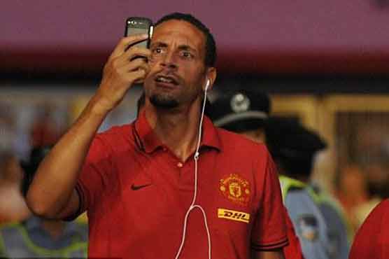 Football: Ferdinand banned, fined over Twitter comment