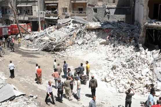 Syria regime raids kill 10 in camp for displaced: NGO