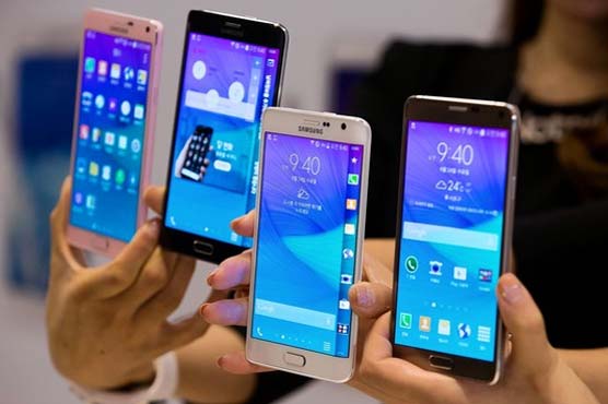 Samsung vows changes after mobile profit plunges