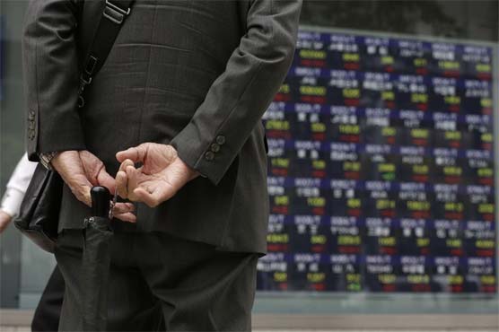 Japan stocks soar 5 percent, yen falls on stimulus