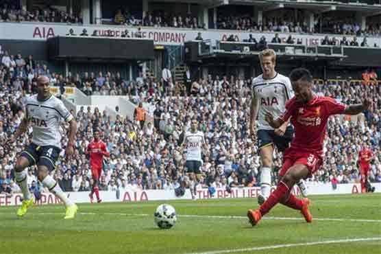 Football: Liverpool ease past Spurs, Arsenal held