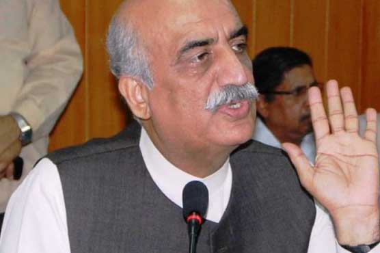 Shah urges Imran Khan to give up stubborn attitude