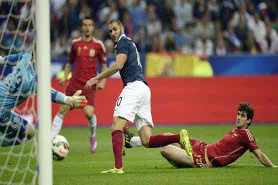 Football: Remy strike condemns Spain to friendly defeat