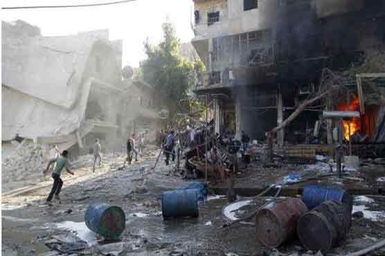 Deadly barrel bombs 'hit taxi stand' in Syria's Aleppo