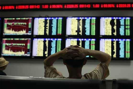 Asian shares mostly lower, dollar rallies 