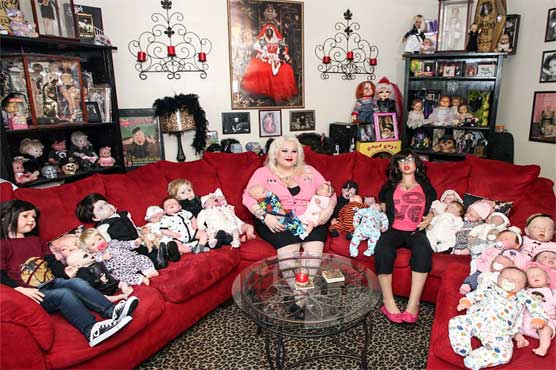 Doll fanatic treats dolls like her kids