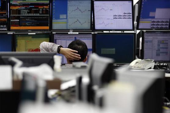 Asian shares slip ahead of US Fed decision