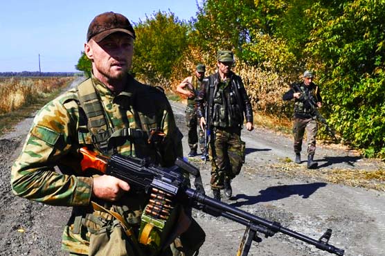 Ukraine to ratify EU pact, offers rebels self-rule