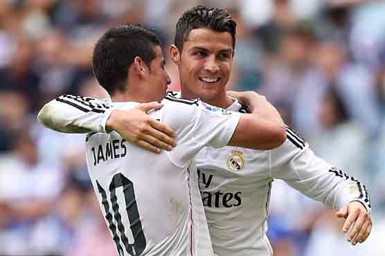 Ronaldo scores 3 as Madrid thrashes Deportivo 8-2