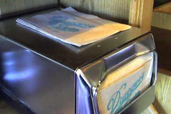 Man who ate napkins to conceal insider trading pleads guilty