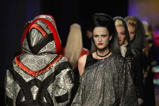 Paris fashion takes to catwalks