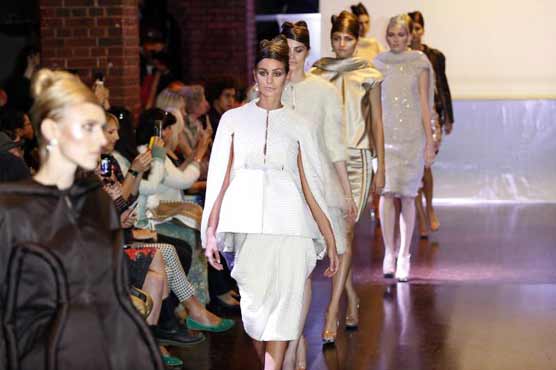 Beehive hair, Mad Men skirts kick off Paris fashion 