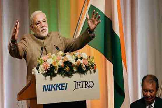 India promises investors more red carpet, less red tape