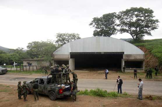 Mexico troops held in killing of 22 gang suspects